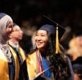 Students smiling at graduation
