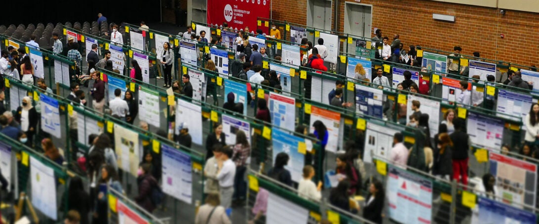 Picture of students presenting at URF from a high stand point