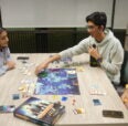 Students Playing a board game