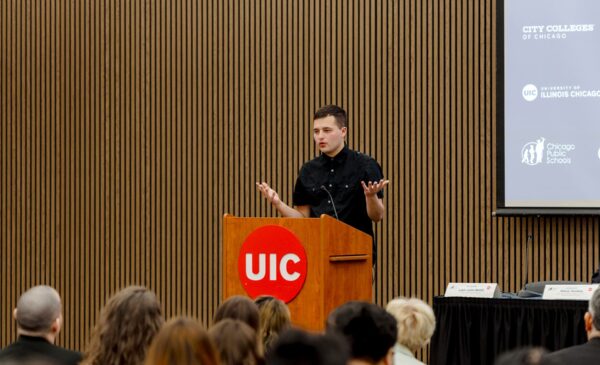 Student speaking at UIC podium